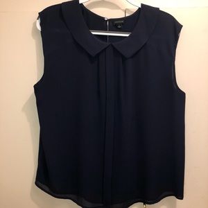 Navy Peter Pan collar, pleat front blouse.